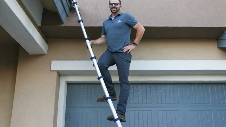 Darrel Fall Owner, Vegas Valley Inspections climbing ladder
